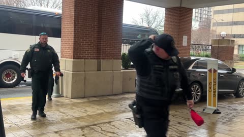 Multi law enforcement agencies from all over the country entering a Marriott hotel in Washington DC