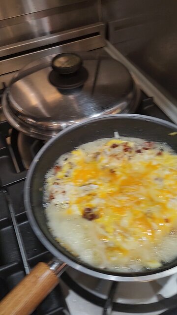... and the results. bacon eggs and melted cheese.