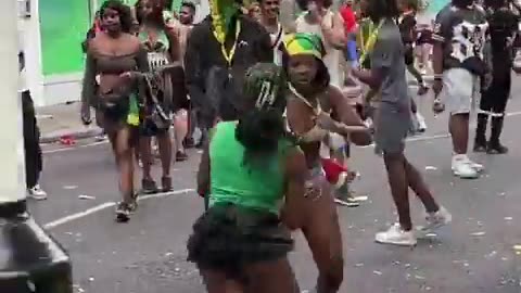 Two women brawl in front of onlookers at Notting Hill Carnival's family and children's day