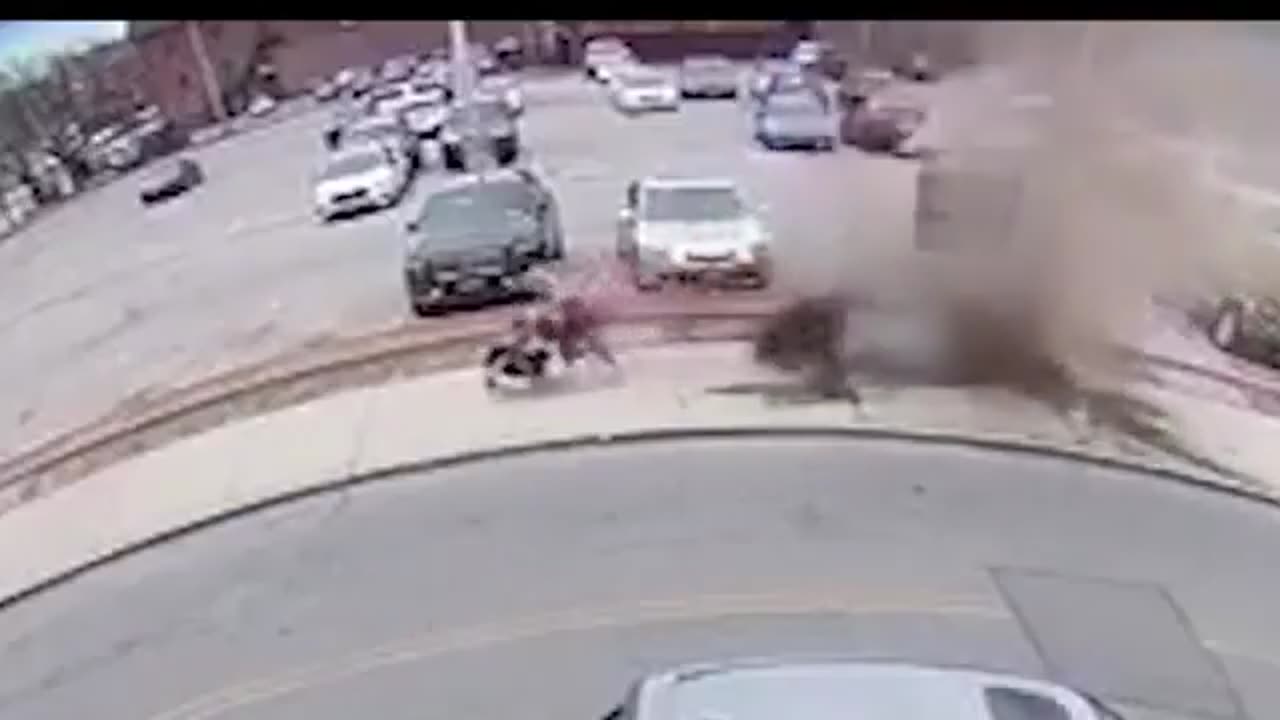 woman and her grandchildren narrowly escaping a manhole explosion