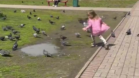 Little Girl Falls Into a Puddle