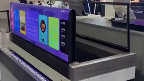 TCL showed off a prototype of their foldable TV The display easily folds in half and hides in a stand