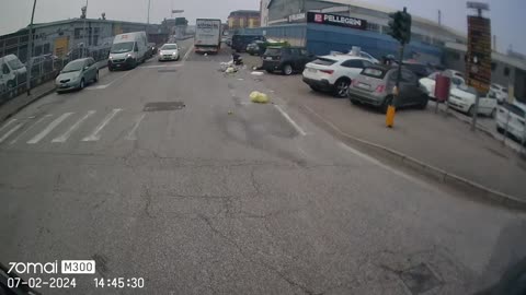 Mini Truck Toppled By Curb Crashes Into Semi