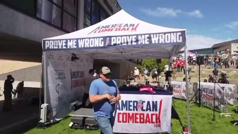 Minutes after Charlie Kirk’s shooting a man in grey uses Kirk’s ch...