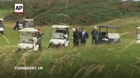 President Trump ignores questions from journalists as he plays round of golf at Scottish resort
