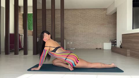 YOGA MOVES IN A CUTE AND COLORFUL SHORT DRESS