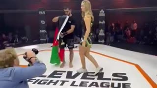 The Islamic fighter doesn't want to be photographed with a woman.
