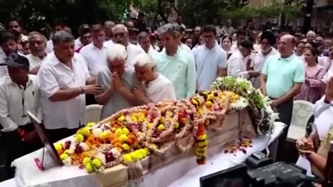 Hundreds mourn 'hero' Air India pilot at funeral service