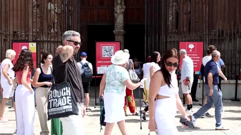 Barcelonans protest overtourism with smoke bombs and water guns