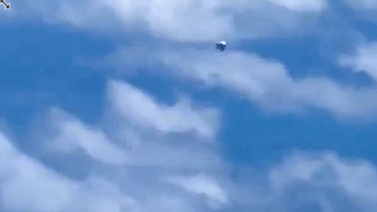 Plane Passenger Captures UFO on Video