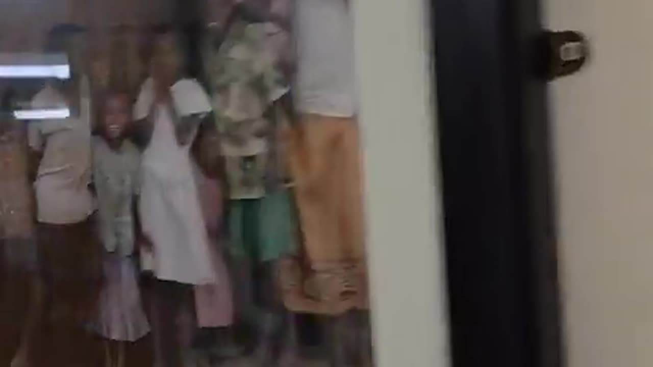 Why are the corridors of Mayo Hospital plastered with pictures of AFRICANS
