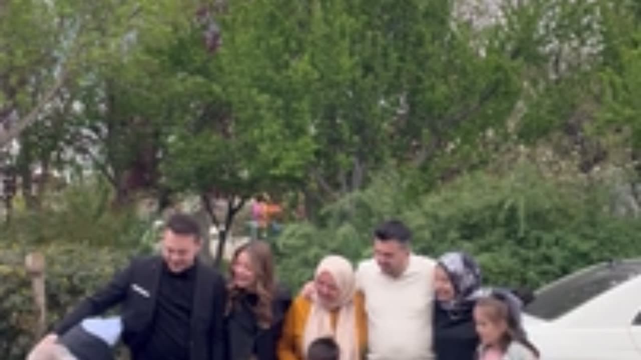 Woman Loses Balance While Rushing Into Family Photo Frame