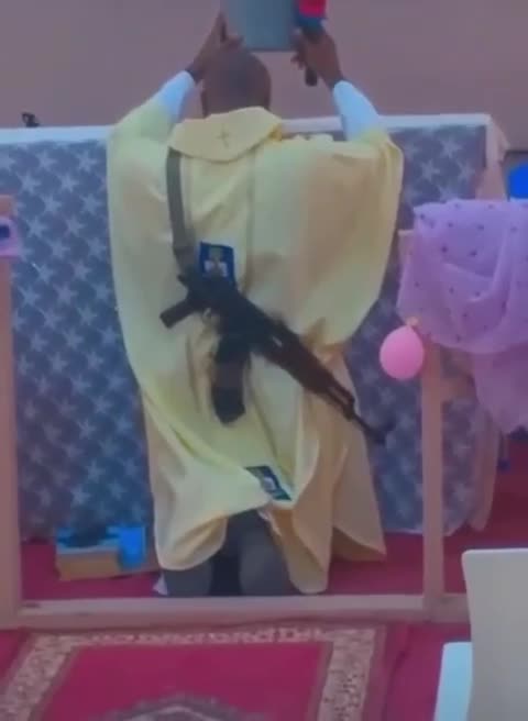 WTF a father with a gun in church to protect church money or what.😮