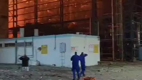 Fire breaks out following the Iranian missile strikes on an oil refinery in occupied Haifa