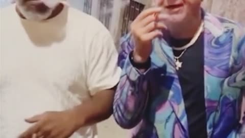 Mike Tyson and Ric Flair getting high on the street