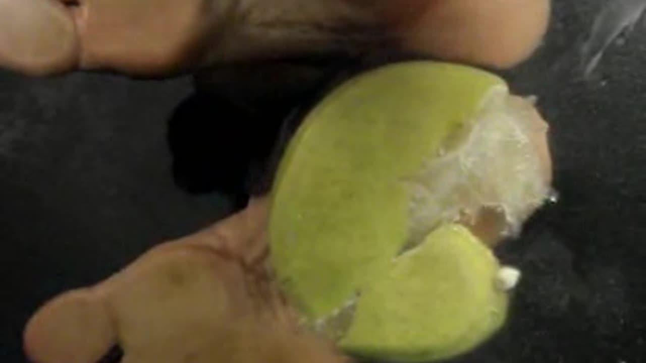 Barefoot Fruit Crushing on the Glass