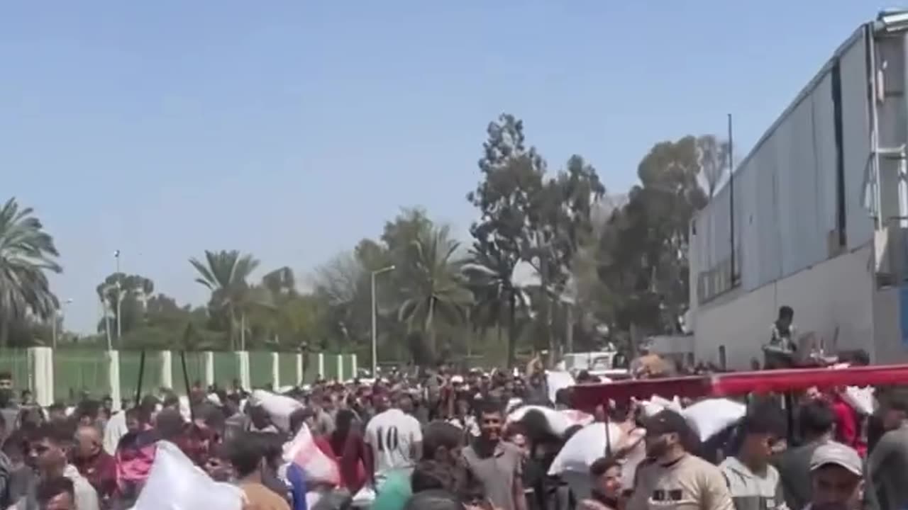Palestinians struggle to get flour amid the ongoing famine and blockade in Gaza