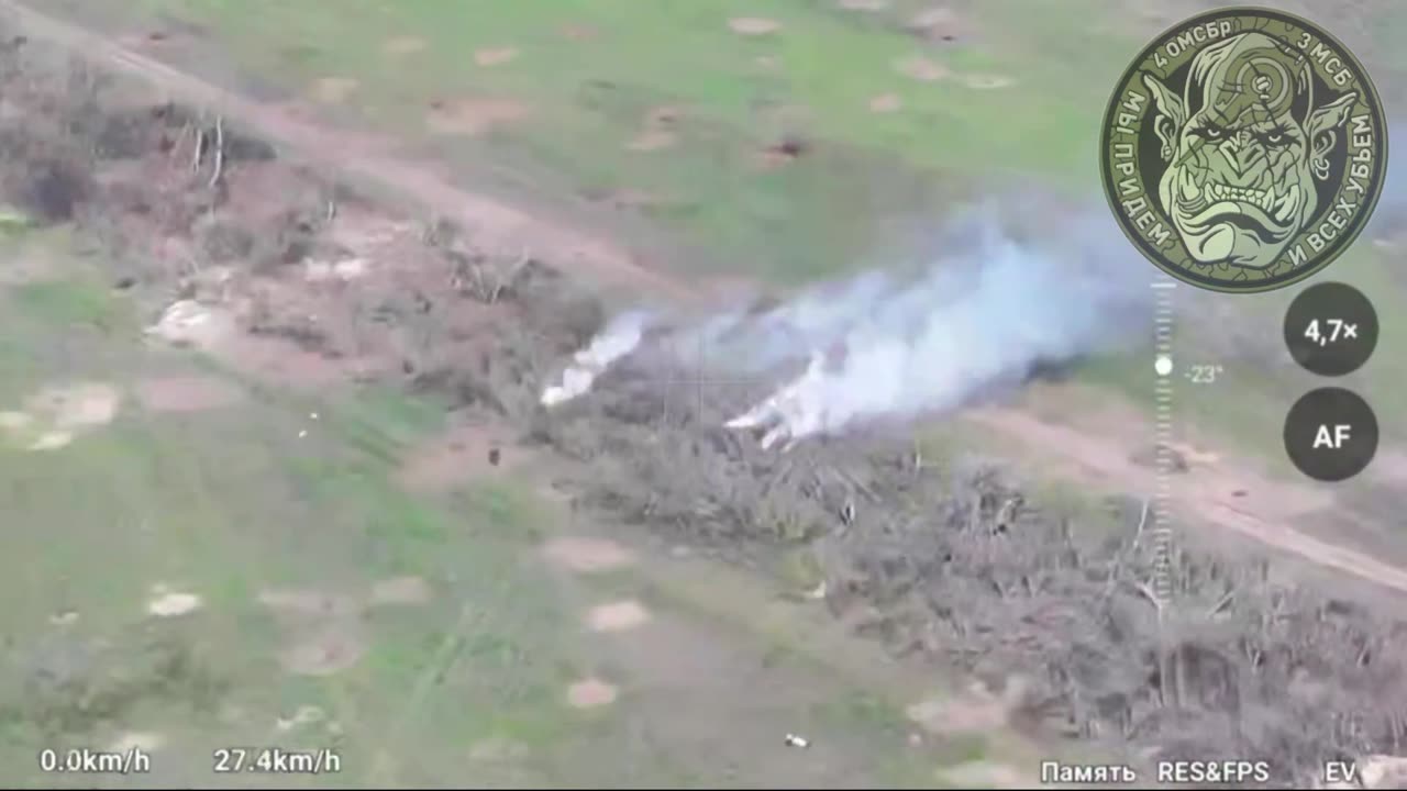 Russian soldiers doing a motorcycle assault on Ukrainian positions