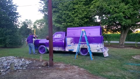 Second coat of plum crazy purple metallic paint on a 1974 Dodge service truck