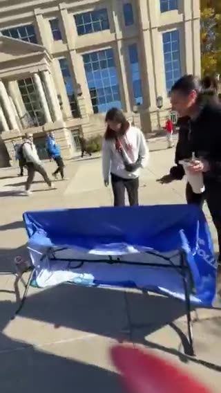 🚨 19-year-old transgender man ARRESTED after destroying a TPUSA table at the University of Iowa.