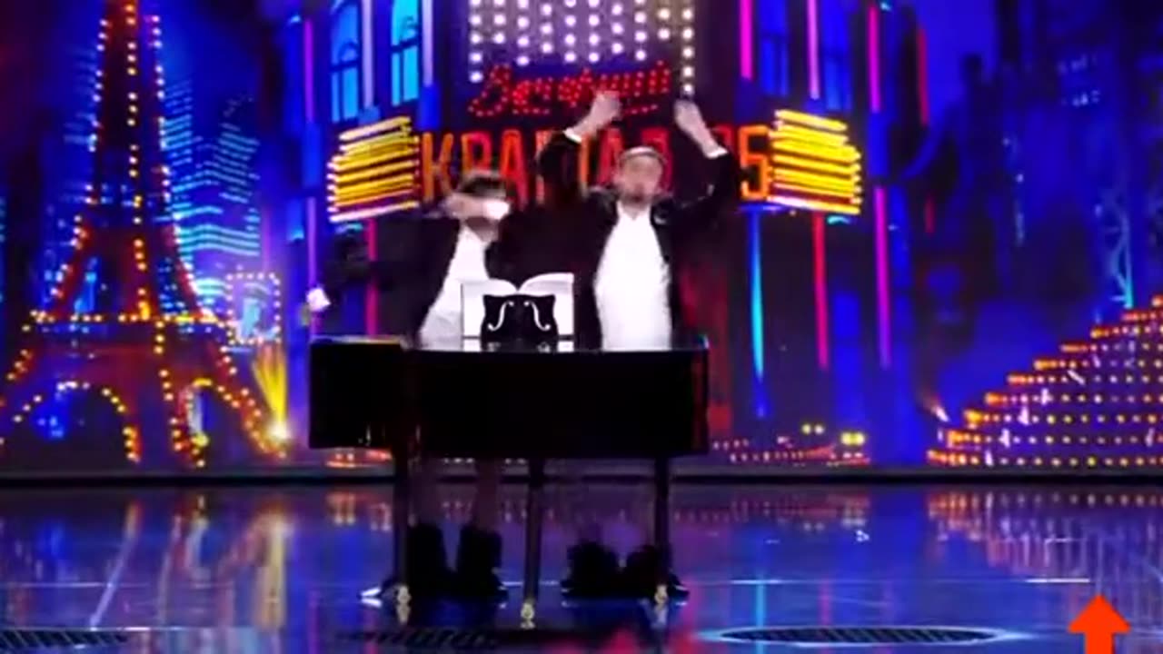 President Zelenski of Ukraine plays piano with his Penis