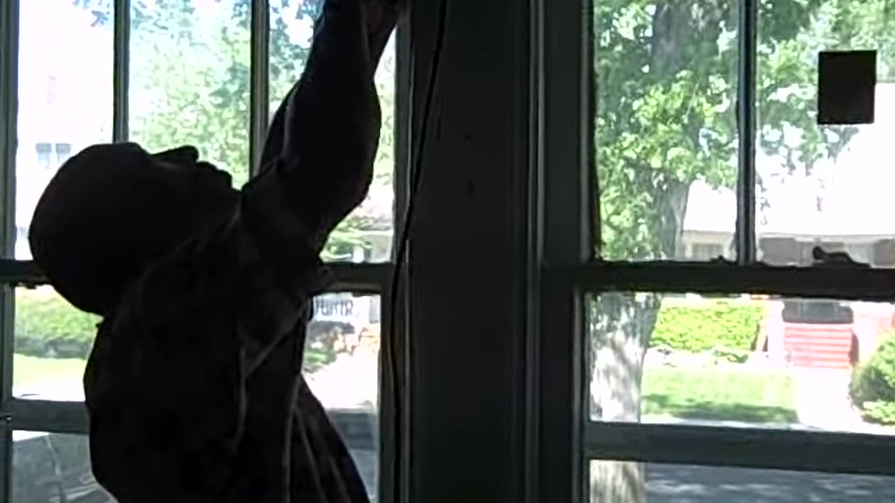 DAVE HANGING BLINDES ON THE SHEA SHOW
