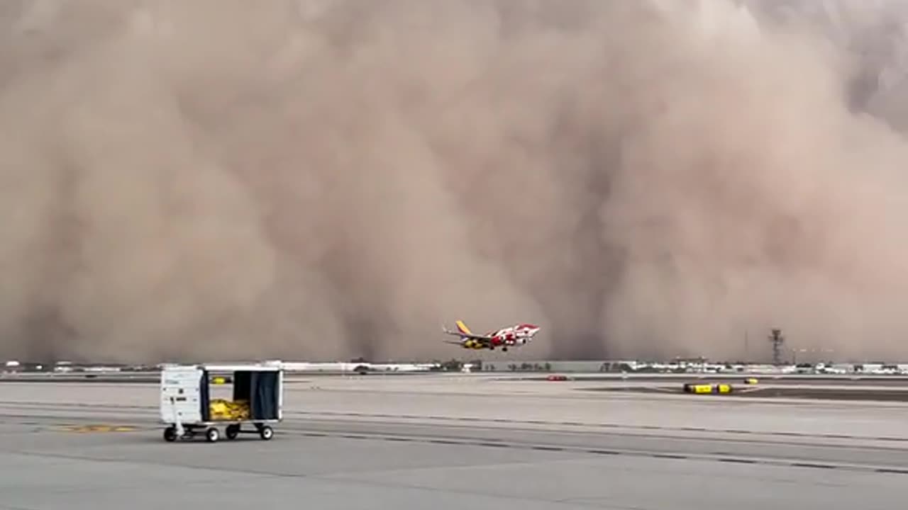 Massive Dust Storm Rolls in as Plane Takes Off