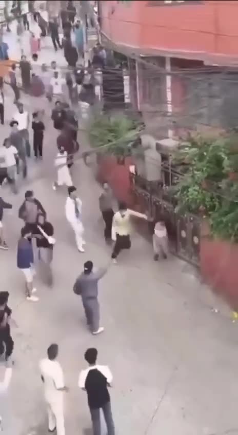 Finance Minister is Physically Removed from Office, Karated into a Wall By Protesters in Nepal