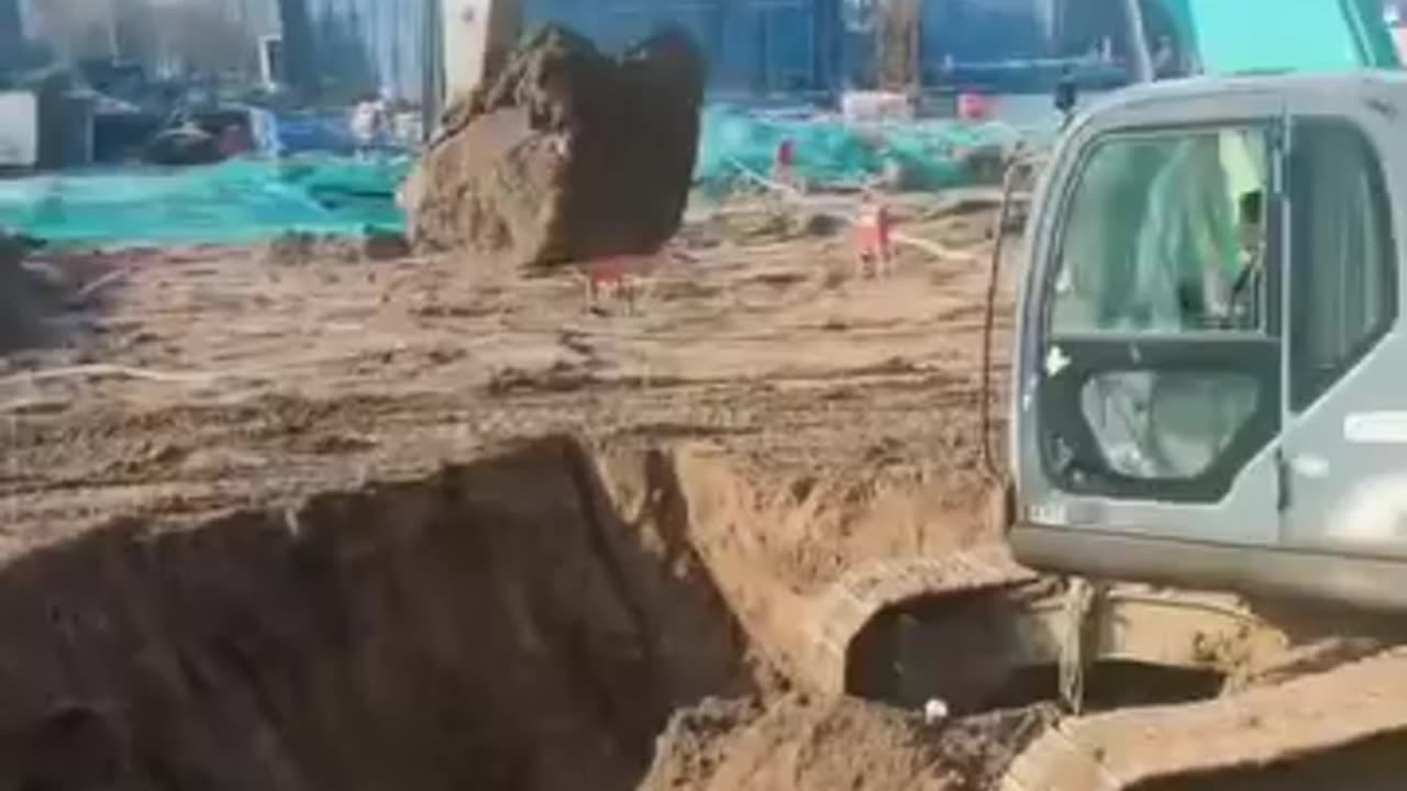 Excavator Digging at a Construction Site