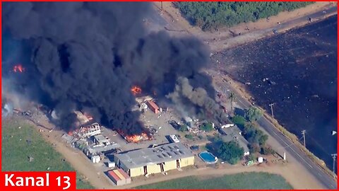 Fireworks explode as smoke billows from burning pyrotechnics warehouse in California