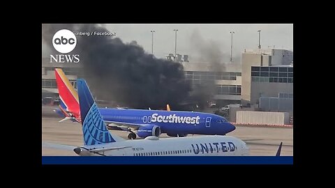 American Airlines flight catches fire at Denver airport