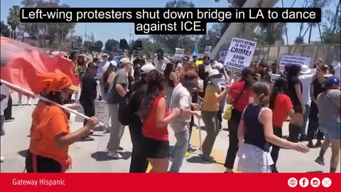 Left wing protesters shut down bridge in LA to dance against ICE