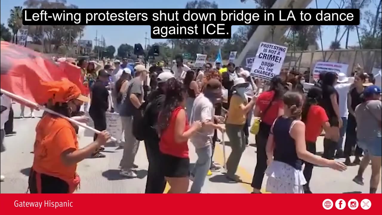 Left wing protesters shut down bridge in LA to dance against ICE
