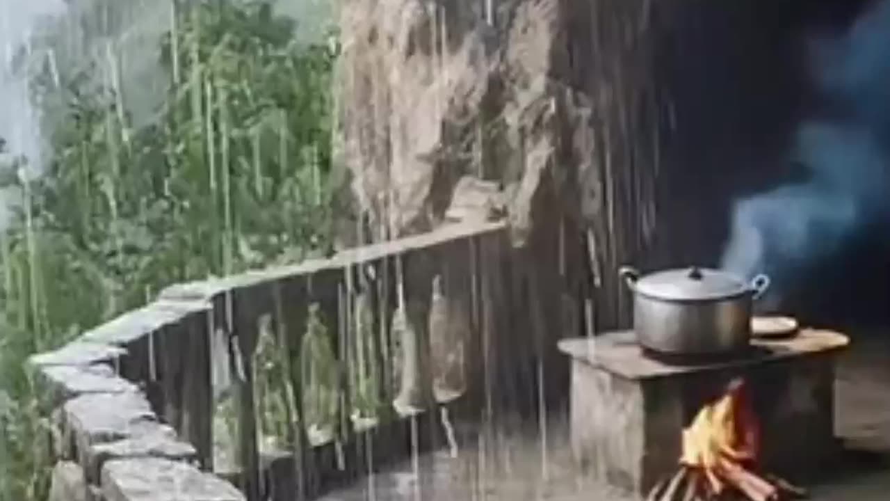Rustic Cave Patio Cooking in Rainstorm.