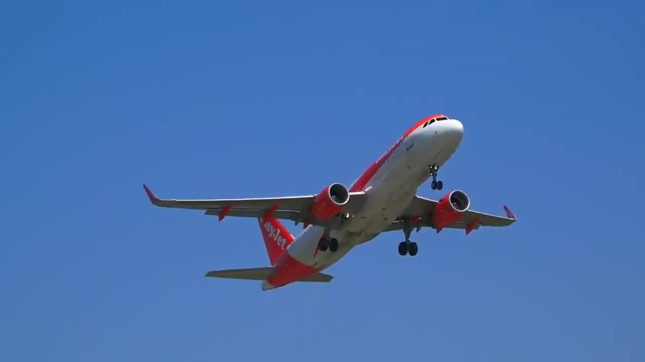 Airbus A320 goes around for a second approach at the airport of Basel, Switzerland