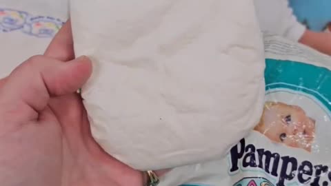 small size-different vintage pampers plastic diapers like Disney characters on diapers