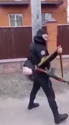 A Ukrainian soldier publicly flogging a civilian