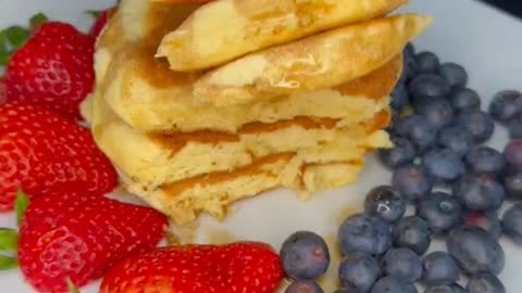 Fluffy Pancake of strawberry and blueberry for breakfast