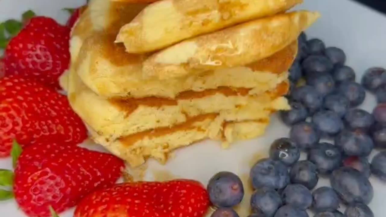 Fluffy Pancake of strawberry and blueberry for breakfast