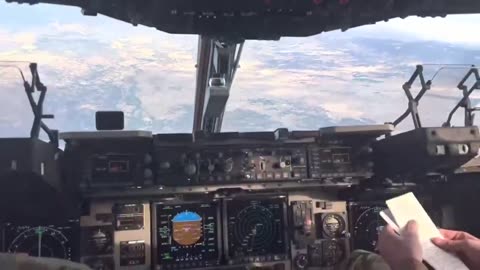 Pilots of this Boeing C-17 Globemaster III engage engine reverse at about 6000 meters altitude