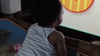 Isaiah watching tv