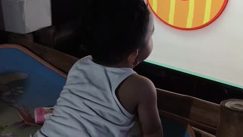 Isaiah watching tv