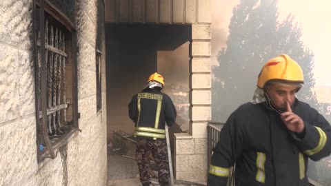 Smoke billows as Israeli troops raid West Bank town
