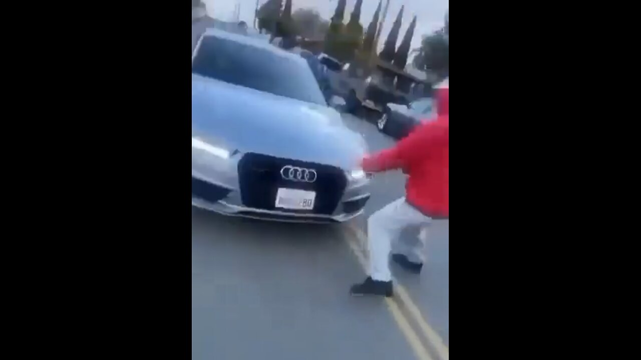 Two guys try to rob a car 🚗 one of them gets run over by the driver