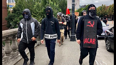 Watch Antifa Surround, Charge at Mother Holding a Baby and Frightened Toddler