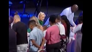 Paula White baptizes babies in strange ceremony