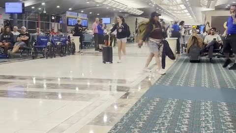 Woman Kicks Airline Agent During Epic Crash Out