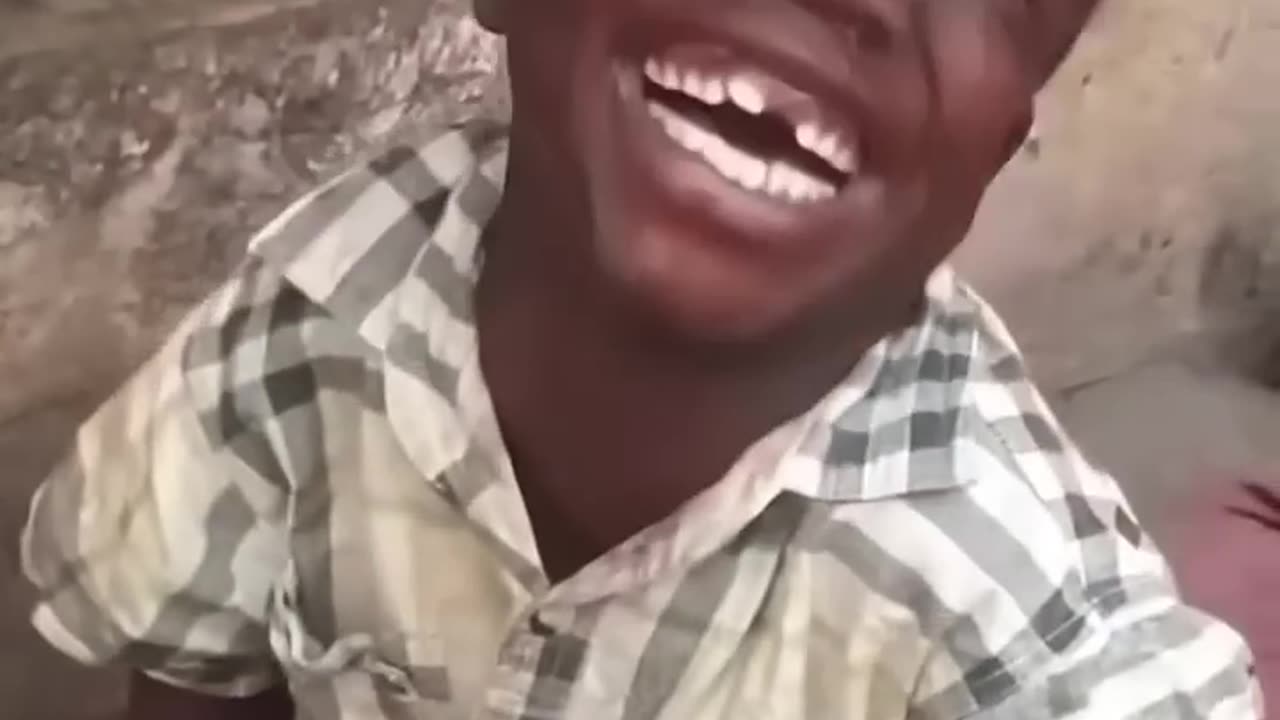 African boy crying after laughing meme