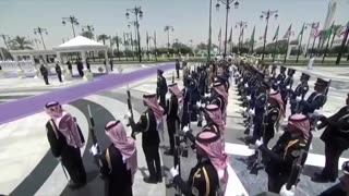 POTUS salutes as The Star-Spangled Banner is played outside the Saudi Royal Court in Riyadh