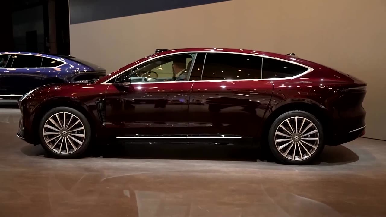 At Shanghai's auto show, carmakers lure drivers with innovations